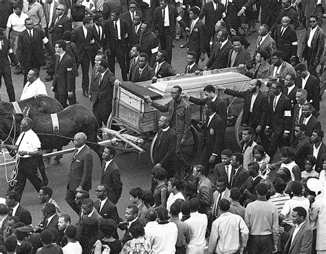 The casket of Dr. Martin Luther King Jr. is pictured during the funeral procession through the ...