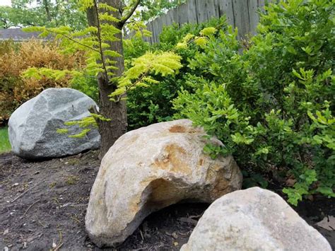 Using Boulders in the Landscape - Sweeney's Custom Landscaping Inc