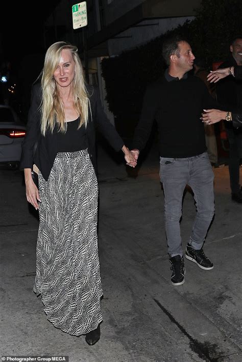 Kimberly Stewart rocks a flowing maxi skirt on a date night with her ...