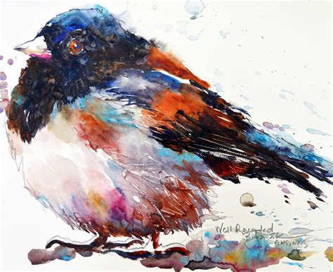 a colorful bird sitting on top of a wooden branch next to watercolor paint splatters