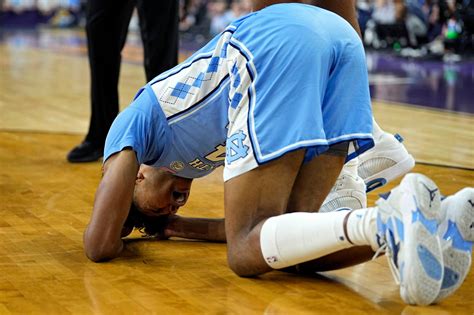 North Carolina's Puff Johnson collapsed, vomited on court