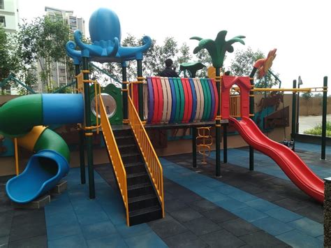 FRP Yellow Playground Tube Slide at best price in Rajkot | ID: 26560706891