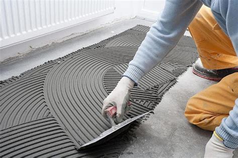 How To Apply Adhesive For Tiles At Home? | TimesProperty