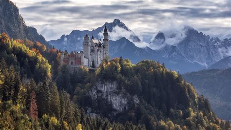 Germany Neuschwanstein Castle Surrounded By Green Trees Covered Mountains HD Travel Wallpapers ...