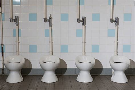 Top 60 Girl Using Urinal Stock Photos, Pictures, and Images - iStock