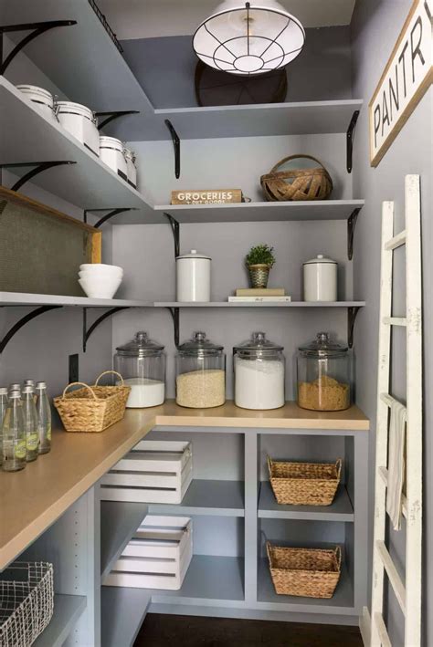 an organized pantry with shelves and baskets