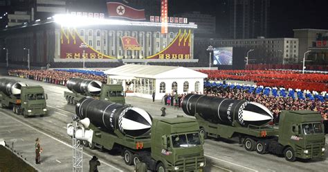 Missiles on display as Kim Jong Un oversees North Korea military parade
