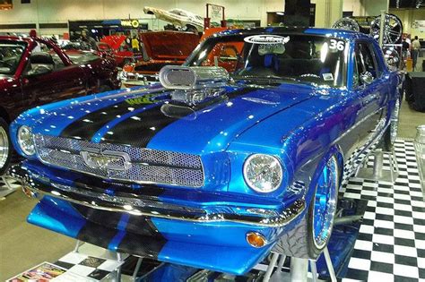 Ford mustang custom paint job | classic Mustang wearing an electric blue paint job and plenty of ...