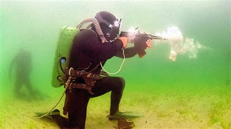 Firing An Underwater Rifle - YouTube