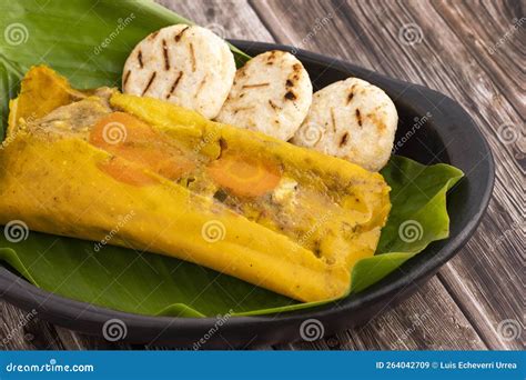 Traditional Colombian Tamales - Wrapped in Green Banana Leaves Stock ...