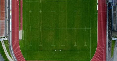 stadium with rugby field and athletics t... | Stock Video | Pond5