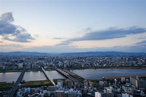 Premium Photo | High angle view of osaka city with yodo river at sunset ...