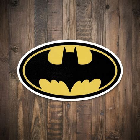 Premium Vector | Batman sticker featuring the iconic Batman symbol