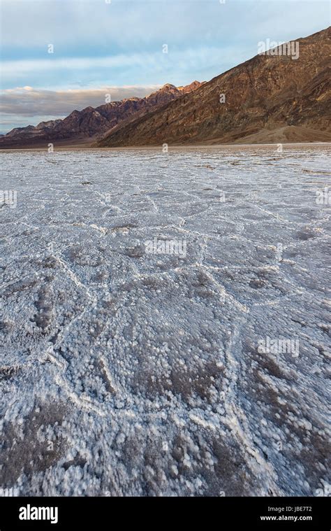 The iconic landscape of Badwater Basin, lowest elevation in the western hemisphere, during ...