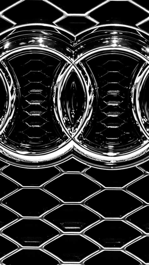 Audi emblem on a grille - Metal logo wallpaper Wallpaper Download 1080x1920