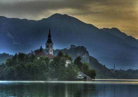 Sunrise on Lake Bled Photograph by Don Wolf | Fine Art America