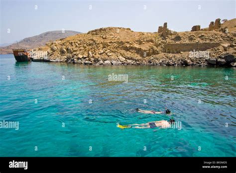 Tourist Couple Snorkeling at Telegraph Island on the Musandam Stock Photo: 31429361 - Alamy