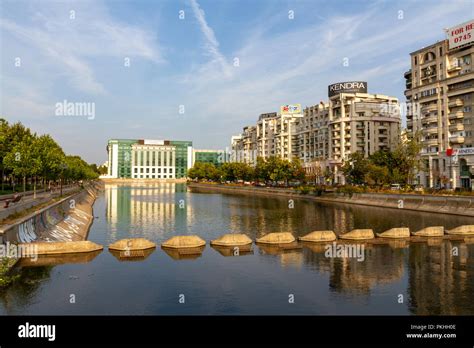 The National Library of Romania (Biblioteca Națională a României) viewed along the Dâmbovița ...