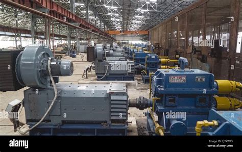 The inside of a factory full of machinery engines Stock Photo - Alamy