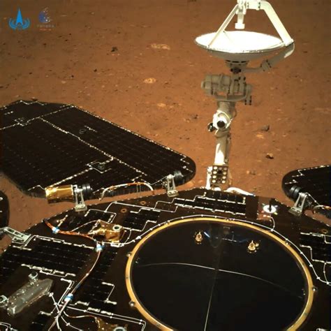 Chinese Mars rover beams back first photos