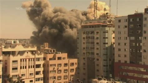 Israel strike in Gaza destroys building with AP, other media - ABC7 New ...