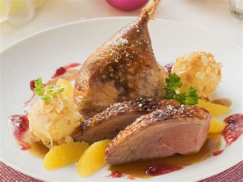 Roast Christmas Duck with Orange Sauce and Dumplings Recipe | EatSmarter