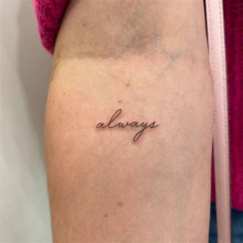 "Always" lettering tattoo done on the inner forearm.