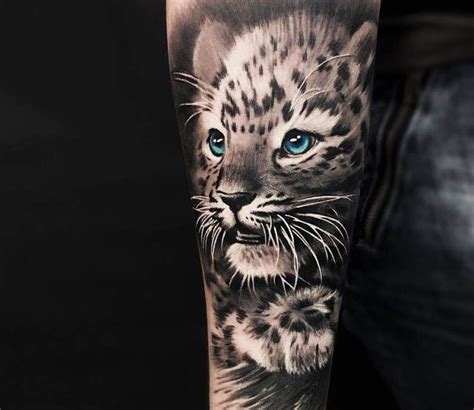 World Tattoo Gallery | Tattoo website with Best Tattoos | Leopard tattoos, Snow leopard tattoo ...