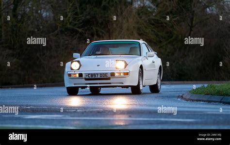 1985 white Porsche 944 classic car with pop up headlights on Stock ...