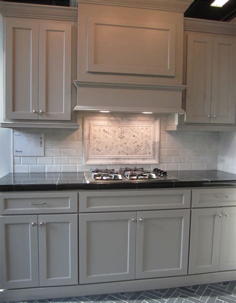 kitchen with gray painted cabinets marble backsplash and black herringbone floor | {My Work ...