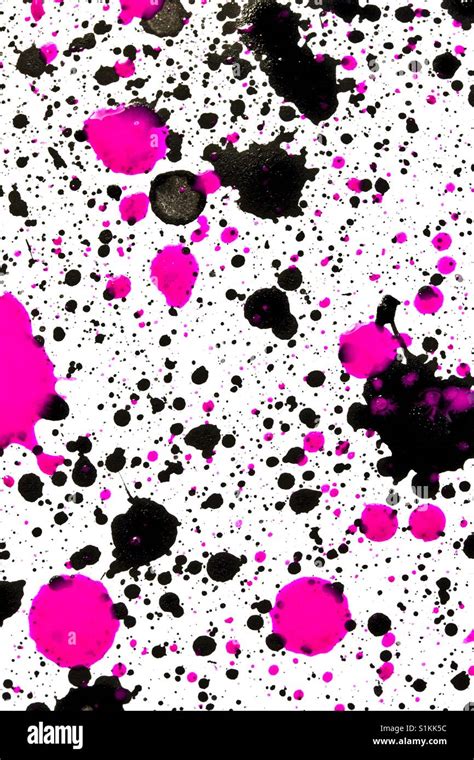 Pink and black splatter paint abstract Stock Photo - Alamy