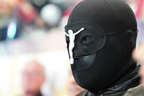 Why is the mask worn by Kanye West at the Super Bowl at the center of a fashion controversy ...