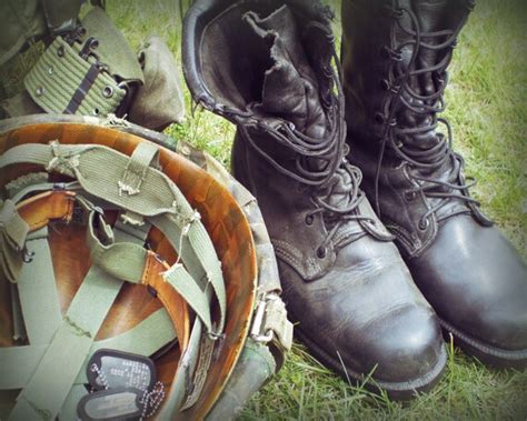 Soldier's Gear Photograph Army Boots Army Helmet