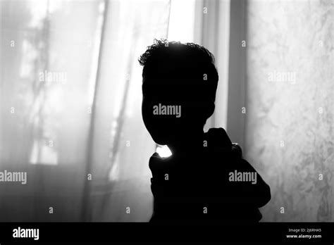 Little boy shadow silhouette Stock Photo - Alamy