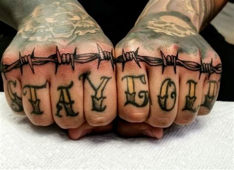 Knuckle tattoo | Hand and finger tattoos, Knuckle tattoos, Barbed wire tattoos