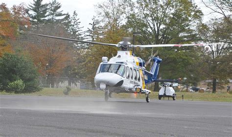 A New Jersey State Police helicopter lands in the parking - PICRYL ...