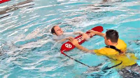 Defensive Block with Torpedo Buoy RLSS National Pool Lifeguard 8th Edition - YouTube