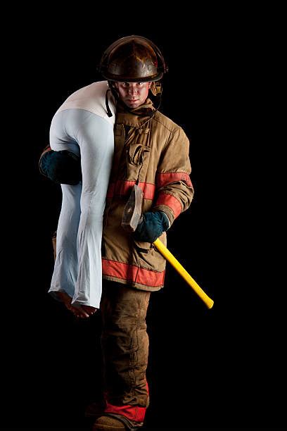 Fireman Carry Stock Photos, Pictures & Royalty-Free Images - iStock