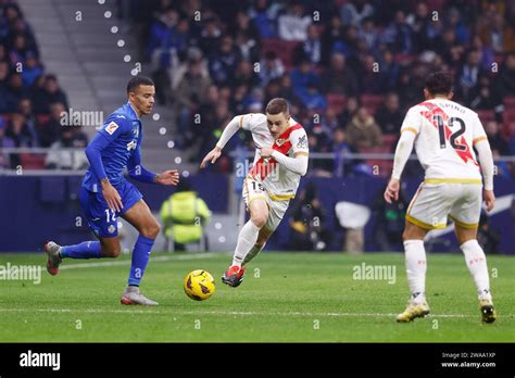 Mason Greenwood of Getafe CF and Jorge de Frutos of Rayo Vallecano ...