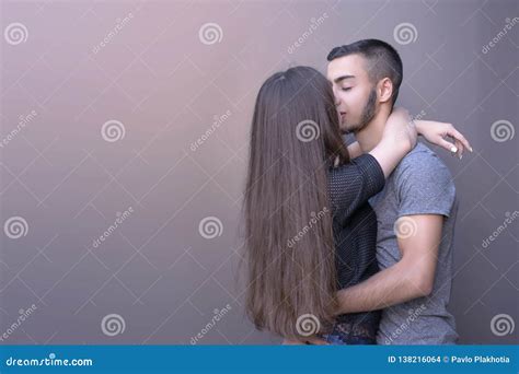 Sweet lovers embracing stock photo. Image of hugging - 138216064