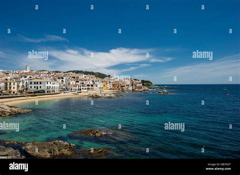 Village with a sandy beach on the sea Stock Photo - Alamy