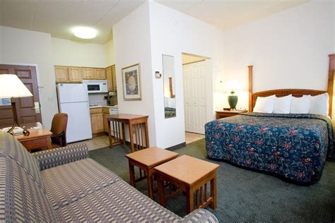 A look inside an extended stay hotel room with a kitchenette. photo by ...