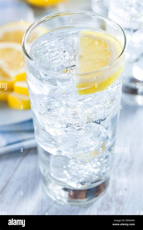 Refreshing Ice Cold Water with Lemon ready to drink Stock Photo - Alamy