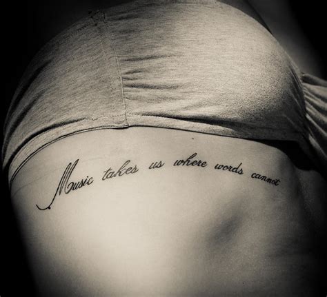 Tattoo Music Quote Photograph by Grace De Bruyne