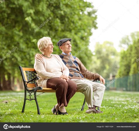 Elderly Couple On Bench