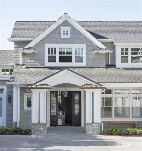 The home's shingle-style exterior gives a nod to traditional East Coast architecture. | Gray ...