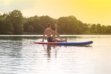 Stand Up Paddling SUP Back Yoga Stock Photo - Image of series, trendsport: 95317316