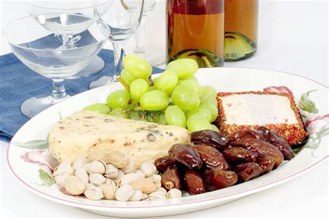 Wine and cheese platter stock image. Image of dates, plate - 2040049