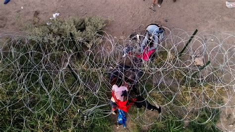 Migrants Chased and Snared in Razor Wire: A Rare Look at Texas' Border Tactics