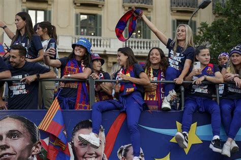 Barca fans celebrate league titles with players in parade | The Straits ...